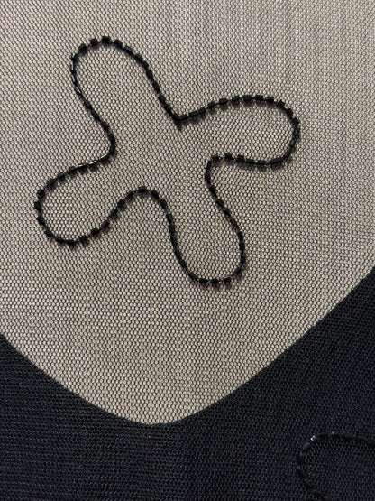 עליונת שקופה מעוטרת (XS-M)